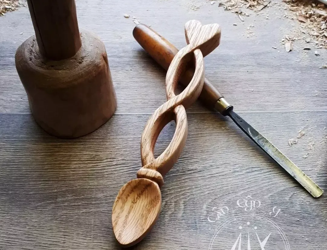 A replica of a simple 19th century lovespoon in oak.